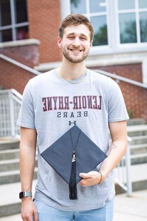 Colby Mashburn standing in front of the McCrorie Center