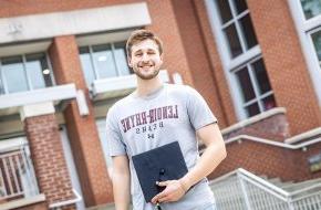 Colby Mashburn stands in front of McCrorie Center