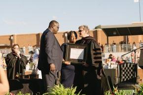 Omari Alexander's parents accept a posthumous bachelor's degree on behalf of their son